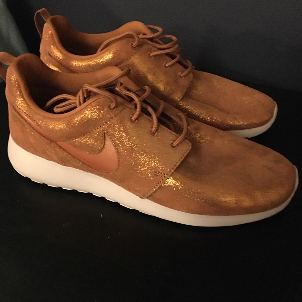 Like new orange sparkly Nike sneakers
